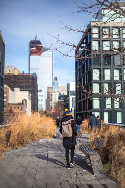 midrange depth of field person walking down the street